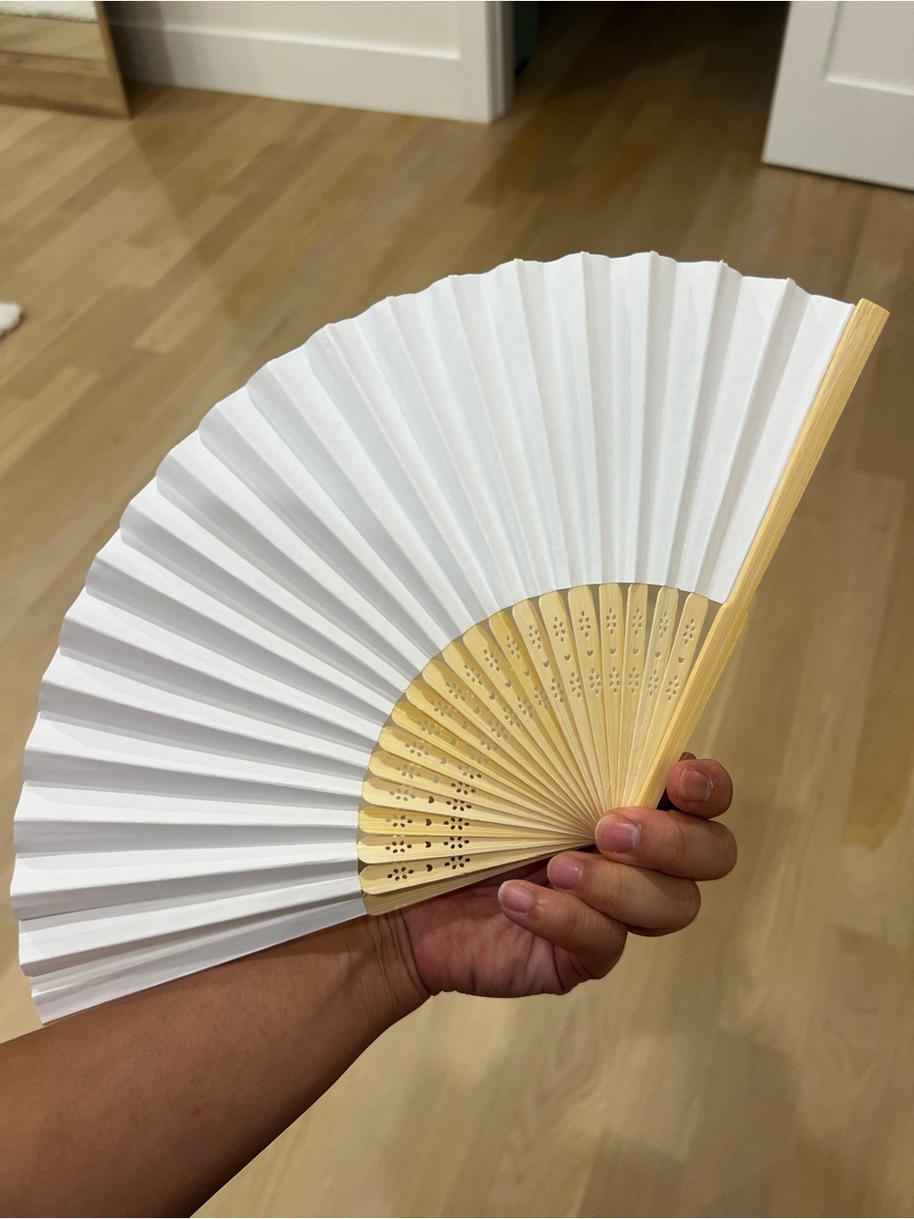 Handheld Folding Fan in White and Natural Wood - Picture 3 of 5